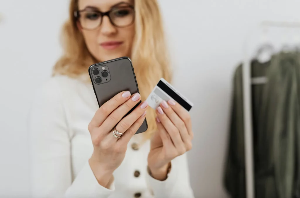 woman with glasses shopping online